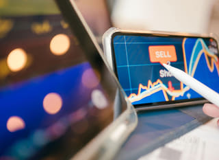 Trader working across multiple markets while reviewing forex options alongside Bitcoin and Ethereum